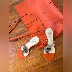 Pelle Moda 3” kitten heel bejeweled thong sandal in coral leather.